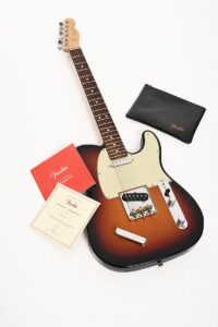 An Electric Guitar on a White Surface