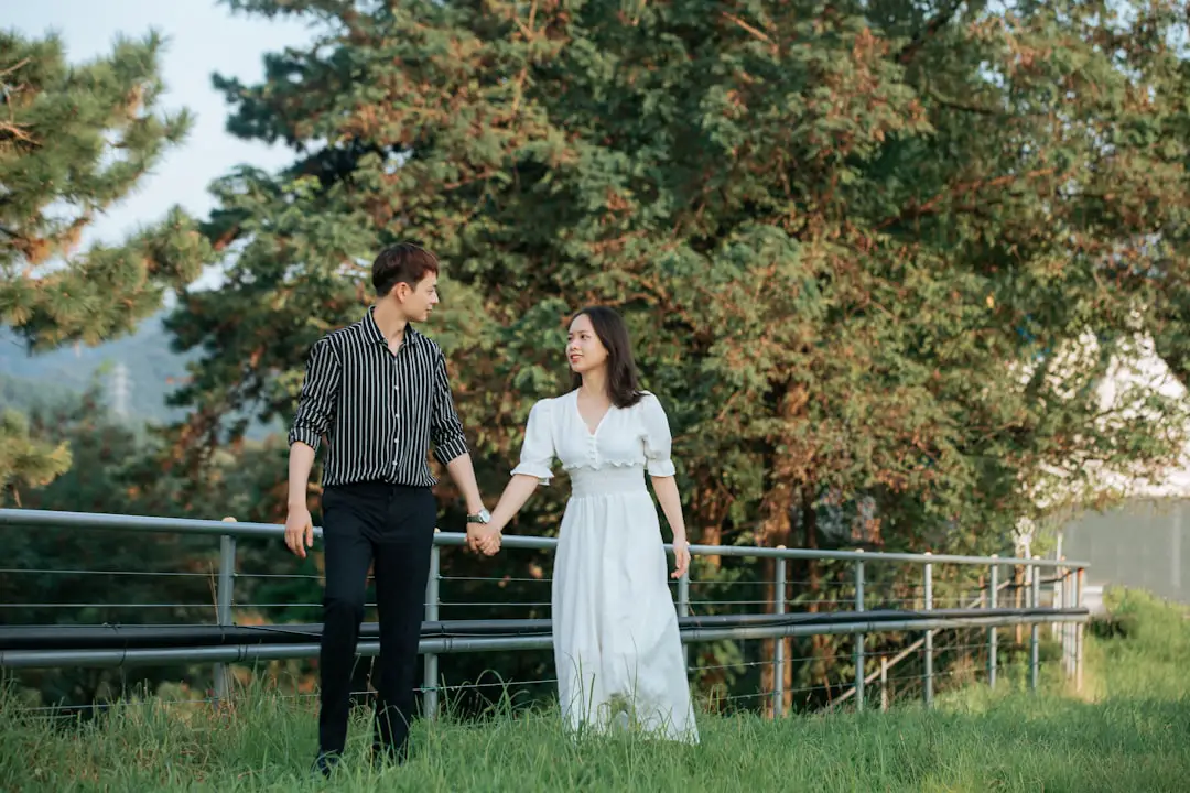 person holding ukulele with guitar in history